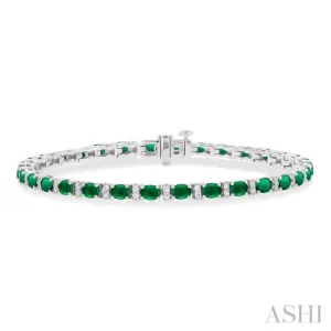 1/3 ctw Oval Cut 4X3 MM Emerald and Round Cut Diamond Precious Bracelet in 14K White Gold