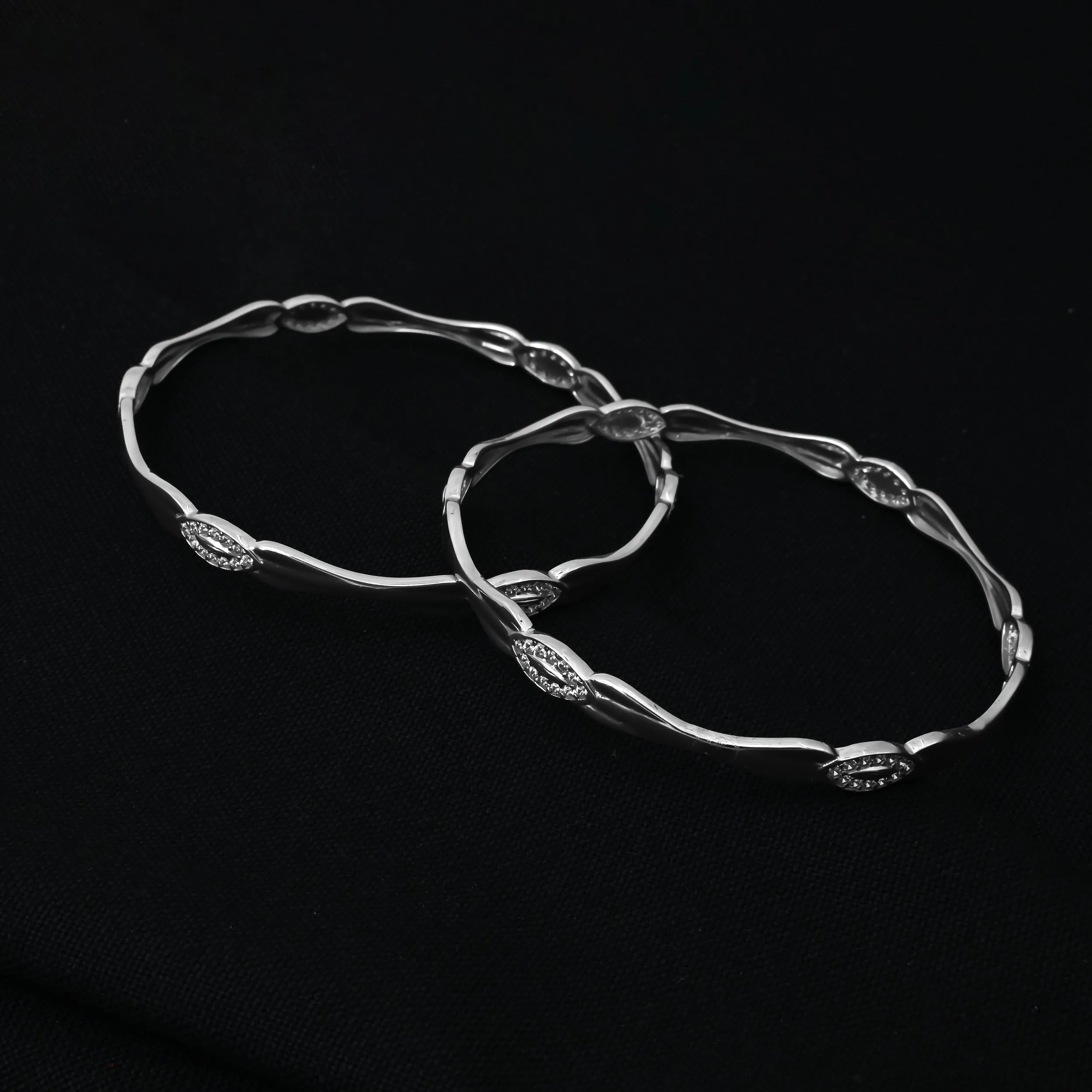 Unique Silver Bangles with Small White Stones Detail.